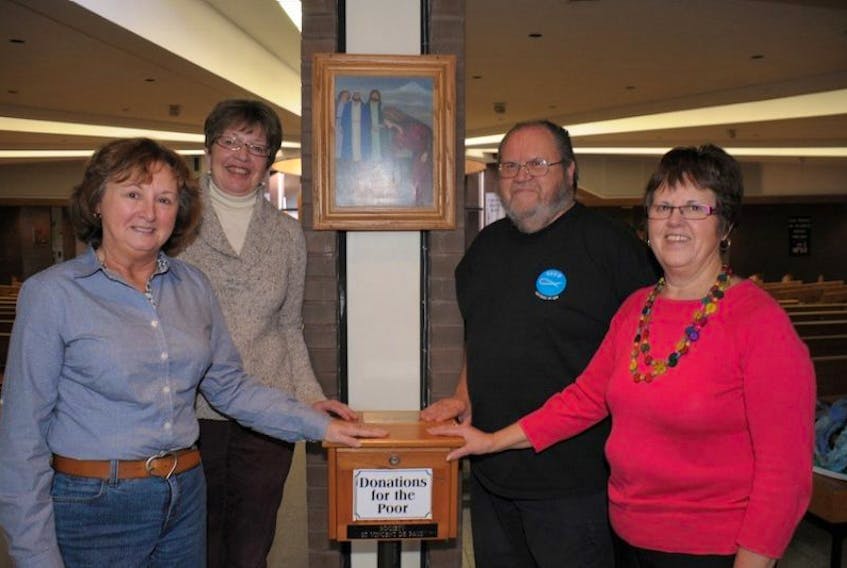 Society of St. Vincent de Paul members Judy Barrett, Pat Coady, Dave Schneider and Cynthia MacDonald are a few of the faces that Islanders in need see in times of financial crisis.