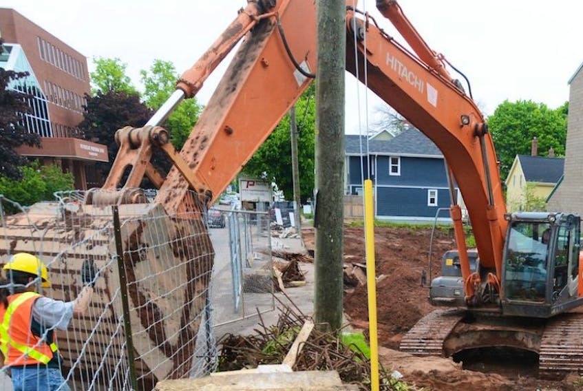 <p>Crews have begun working again on the vacant property at the corner of Prince and Grafton streets in Charlottetown.&nbsp;</p>