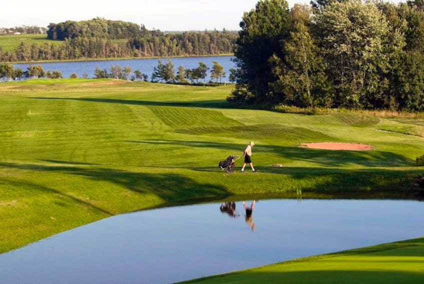 A golfer walks towards a green at the Clyde River Golf Course in this file photo.