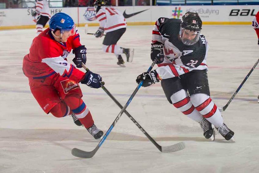 Allex Newhook (right), shown in preliminary-round action against the Czech Republic, had four assists in six games for Team Canada West at the World Junior A Hockey Challenge. — Matthew Murnaghan/Hockey Canada Images