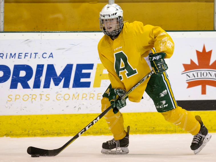 University of Alberta Pandas hockey forward Alex Poznikoff (16) takes part in a team practice at Clare Drake Arena on Nov. 15, 2018. 