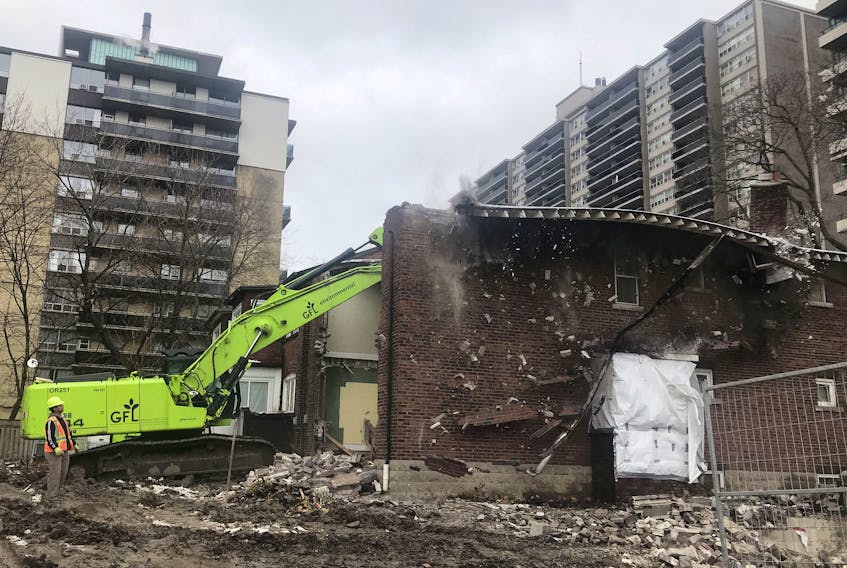 A house is demolished to make way for another condominium development in Toronto, Ontario, Canada November 17, 2018.