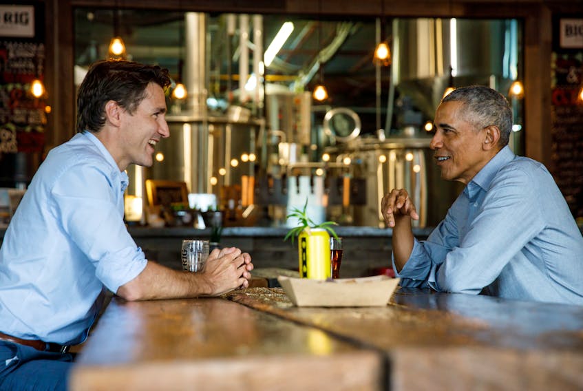 Prime Minister Justin Trudeau and former U.S. president Barack Obama meet at Big Rig brewery in Kanata, Ont., on May 31, 2019. Obama later spoke to an audience of about 12,000 people at an event hosted by the progressive think-tank Canada 2020. - Adam Scotti / Prime Minister's Office / Handout via Reuters