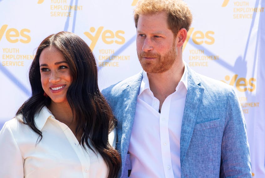 Britain's Prince Harry and his wife Meghan, the Duke and Duchess of Sussex on Oct. 2, 2019 during a visit to South Africa.