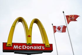 A McDonald's sign of one of restaurants which began testing sales of plant-based "PLT" burgers using Beyond Meat's patties, in London, Ontario.