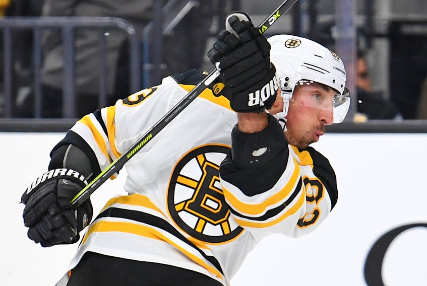 Boston Bruins centre Brad Marchand scores a power play goal on a slap shot during the first period against the Vegas Golden Knights at T-Mobile Arena. - Stephen R. Sylvanie / USA TODAY Sports