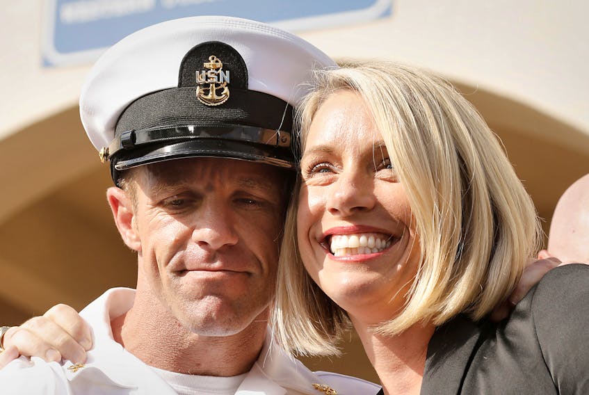 U.S. Navy SEAL Special Operations Chief Edward Gallagher, with wife Andrea Gallagher, celebrate after he was acquitted of most of the serious charges against him during his court martial at Naval Base San Diego in San Diego, Calif., U.S., July 2, 2019. John Gastaldo / Reuters