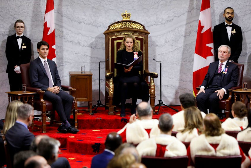 Canada's Governor General Julie Payette delivers the Throne Speech next to Prime Minister Justin Trudeau and Government Representative in the Senate Peter Harder, in the Senate, as parliament prepares to resume for the first time after the election in Ottawa, Ontario, Canada December 5, 2019. REUTERS/Blair Gable