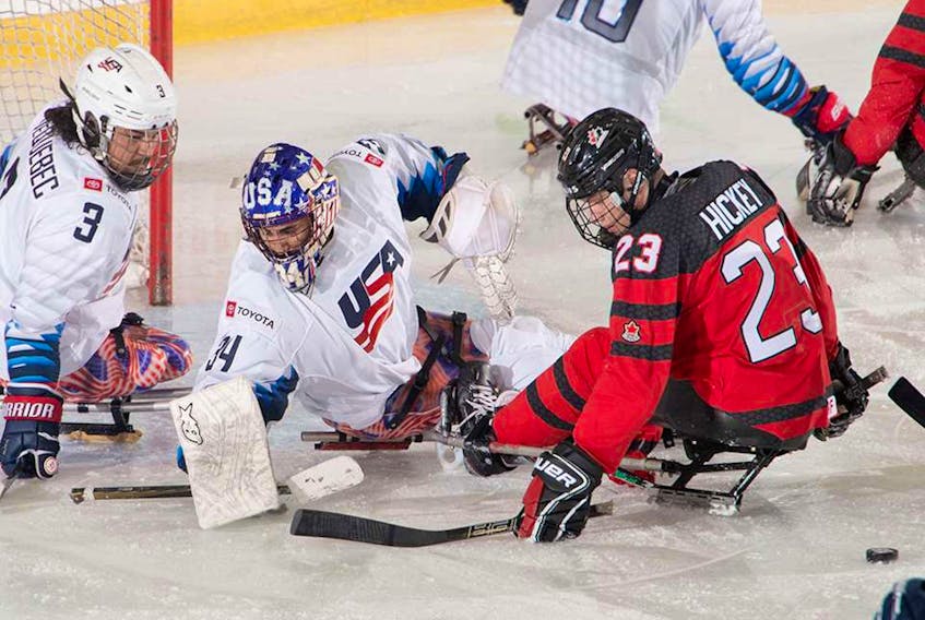 American goalie Steve Cash, backed up by defenceman Ralph de Quebec (left)  stops this shot from Canada's Liam Hickey (23) during their game Wednesday night at the 2019 Canadian Tire Para Hockey at the Paradise Double Ice Complex. — Matthew Murnaghan/Hockey Canada Images