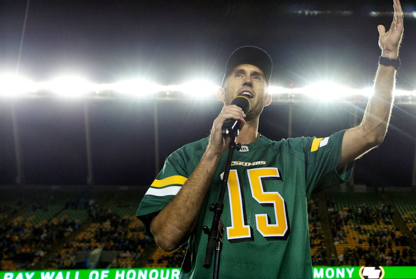 Ricky Ray speaks to the crowd during his Edmonton Eskimos Wall of Honour induction ceremony at Commonwealth Stadium on Sept. 20, 2019.
