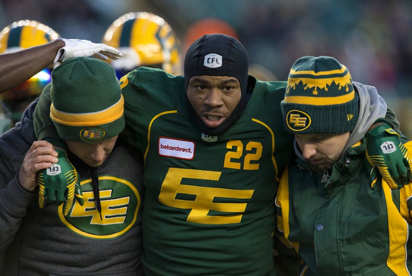 The Edmonton Eskimos return man Christion Jones (22) is helped off the field after being injured against the Saskatchewan Roughriders at Commonwealth Stadium in this file photo from Oct. 26, 2019.