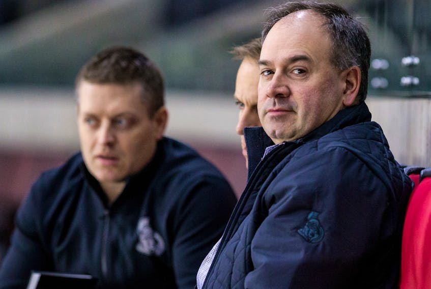 Ottawa Senator General Manager Pierre Dorion watching team practice at the Canadian Tire Centre. December 13, 2019.