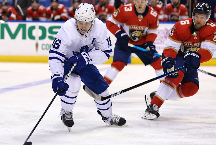 Toronto Maple Leafs right wing Mitch Marner, left, skates with the puck during the first period of the game against the Florida Panthers at BB&amp;T Center in Sunrise,Fla., Feb. 27, 2020. (Sam Navarro-USA TODAY Sports)