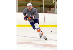 Suffolk's Ross Johnston skates at MacLauchlan Arena in June in preparation for the NHL's return to play.