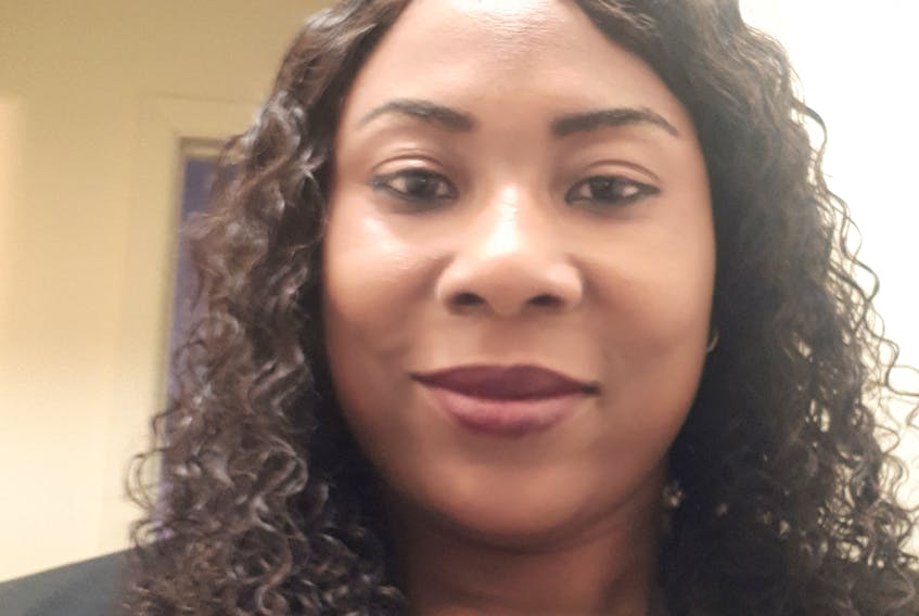 Dayo Agbola, the coordinator of YWCA Halifax's Financial Literacy for Newcomers program, is helping newcomers file their income taxes virtually.