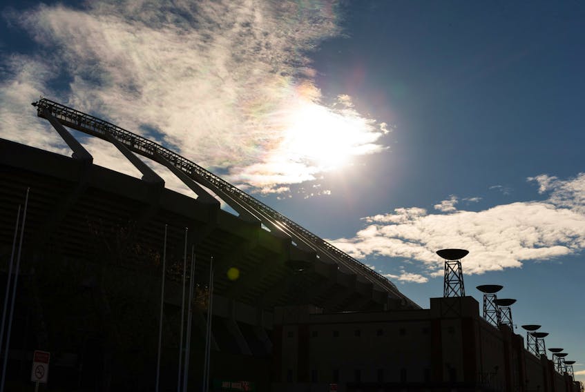 Commonwealth Stadium is silhouetted against the Edmonton sky on Oct. 27, 2020.