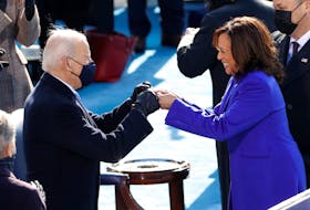 U.S. President Joe Biden and Vice-President Kamala Harris bump hands during inauguration ceremonies on the West Front of the U.S. Capitol in Washington, on Wednesday, Jan. 20, 2021.