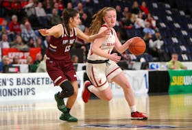 Memorial Sea-Hawks guard Alana Short (right), shown playing against the Saint Mary's Huskies during the 2020 AUS women's basketball playoffs, had the top single-game scoring performance in the Sea-Hawks' pre-season road trip over the weekend, scoring 30 points against SMU. — File photo/AUS