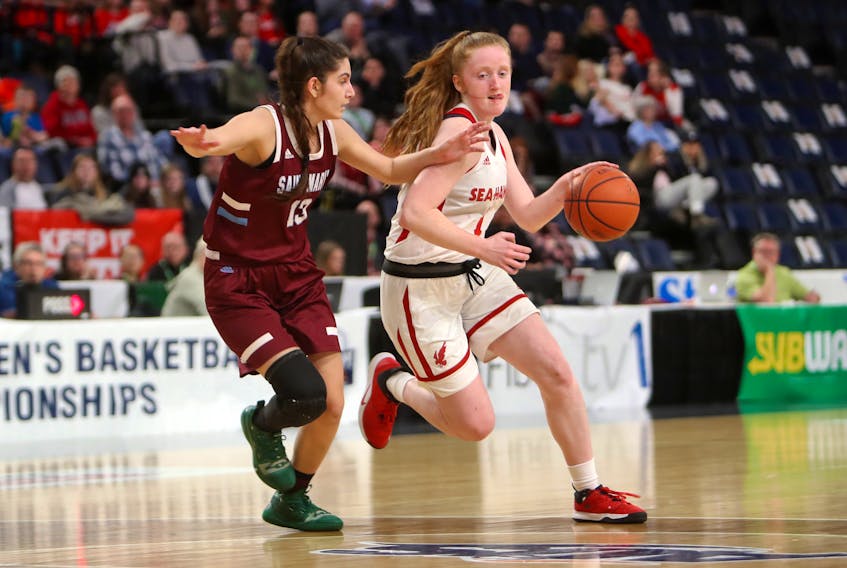 Memorial Sea-Hawks guard Alana Short (right), shown playing against the Saint Mary's Huskies during the 2020 AUS women's basketball playoffs, had the top single-game scoring performance in the Sea-Hawks' pre-season road trip over the weekend, scoring 30 points against SMU. — File photo/AUS
