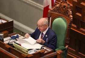 Nova Scotia's Lt.-Gov. Arthur LeBlanc reads the speech from the throne at Province House in Halifax on Tuesday, Oct. 12, 2021.