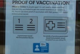 A restaurant in Charlottetown displays a sign telling patrons they need to show proof of vaccination.