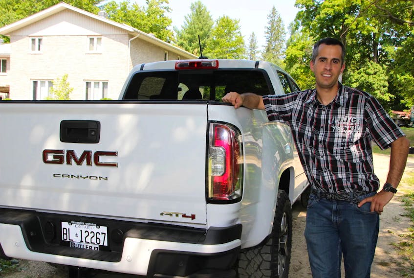 Blake Mitchell hopes he can keep his 2021 GMC Canyon AT4 Diesel for 15 years, so his daughter can drive it. Tina Peplinskie/Postmedia News