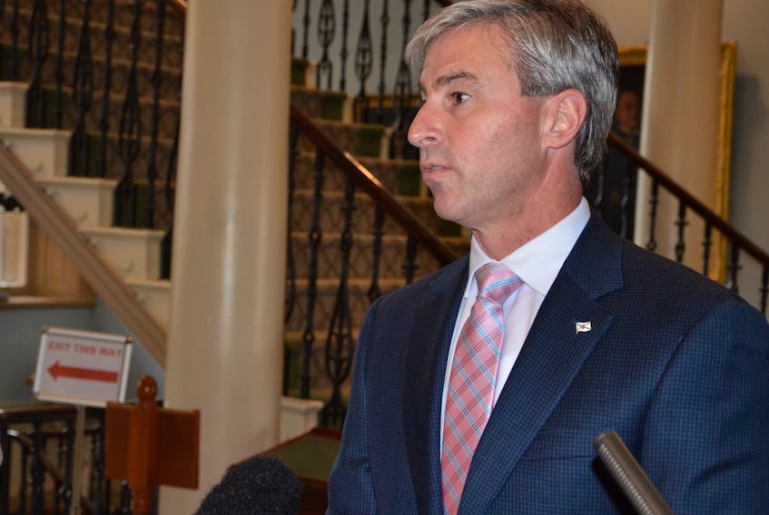 Premier Tim Houston speaks to reporters at Province House in Halifax on Thursday, Oct. 14, 2021.