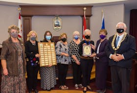 100 Women Who Care - Prince County were awarded the Mayor's Medal of Honour on Tuesday, Oct. 12. Shown, from left: Deputy Mayor Norma McColeman, Elizabeth Noonan, Krista MacDougall, Nicole Morrison, Marie Salamoun-Dunne, Katherine Kelly, nominating committee chair Hazel Hilchey and Mayor Basil Stewart.