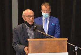 Martin Chernin, president of Harbour Royale Development Ltd., with his lawyer Dwight Rudderham, speaks to CBRM council Tuesday night on his new developmental request, minus the addition of a new library. IAN NATHANSON/CAPE BRETON POST