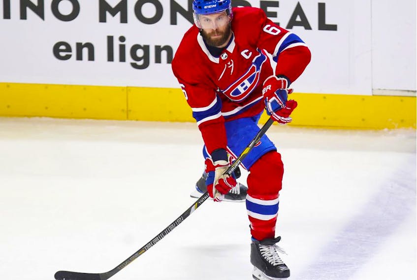 Canadiens Shea Weber moves the puck up ice during first period against the Calgary Flames in Montreal on April 14, 2021.