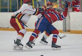 Halifax Macs Matheas Elles, left, checks Kohltech Valley Wildcats Ben Veinot during a Nova Scotia Under-18 Hockey League game in February 2020. SALTWIRE NETWORK