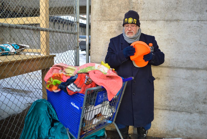 In this file photo from January 2020, Ken Paul, originally of Eskasoni, stands with all his belongings in a shopping cart in Sydney. Paul was experiencing homelessness and the shopping cart was the only thing he had to keep his worldly possessions in. CAPE BRETON POST/FILE PHOTO 