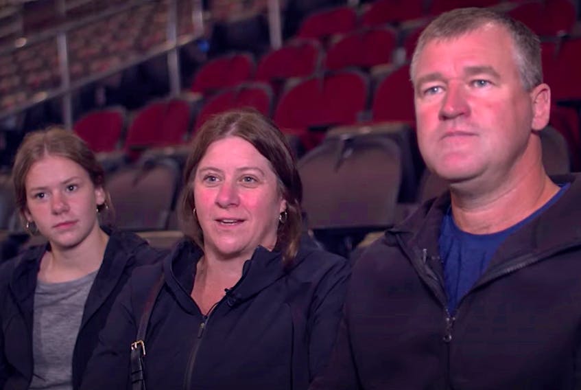 Members of Dawson Mercer's family, (from left) sister Jessica, mother Charlotte and father Craig, are interviewed by Amanda Stein prior to Mercer's first NHL game Friday night in Newark, N.J. — YouTube screengrab.New Jersey Devils