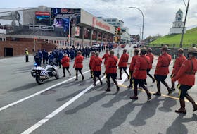 RCMP offcers march toward the Scotiabank Centre and Citadel Hill in Halifax on Sunday in the 39th annual Peace Officers Memorial Service.
