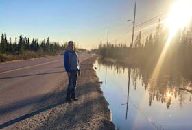 Brad Keats standing on Kelland Drive, directly behind their home in Happy Valley-Goose Bay. 
