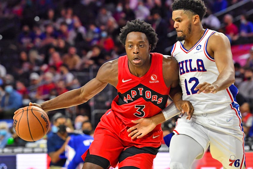 Raptors forward OG Anunoby (left) is defended by Philadelphia 76ers' Tobias Harris during the second quarter at Wells Fargo Center on Oct. 7, 2021.