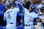 What it George Springer (left) had been healthy all sesaon? And will Marcus Semien return? These are two big questions for the Blue Jays to look back on and ahead to. 