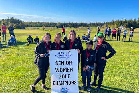 (L-R) Maddy Dyer, Maddy Brown, Maddy Keough and Anh Hoang celebrate with head coach Ashley Praught after winning the 2021 P.E.I. School Athletic Association golf championship on Tuesday, Oct. 12 at Eagles Glenn. 