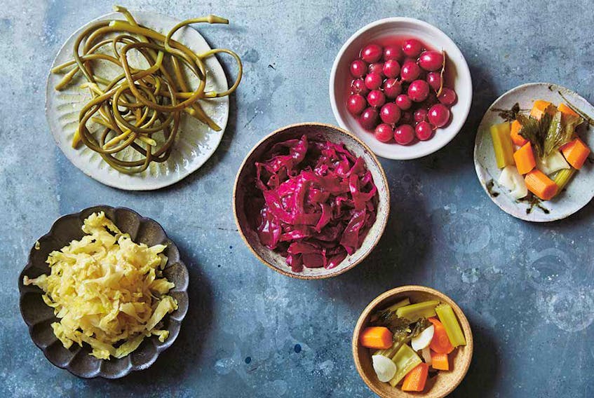 Clockwise from top left: Fermented garlic scapes; fermented red cabbage; fermented gooseberries; fermented celery and carrot; and fermented white cabbage from Amber and Rye.