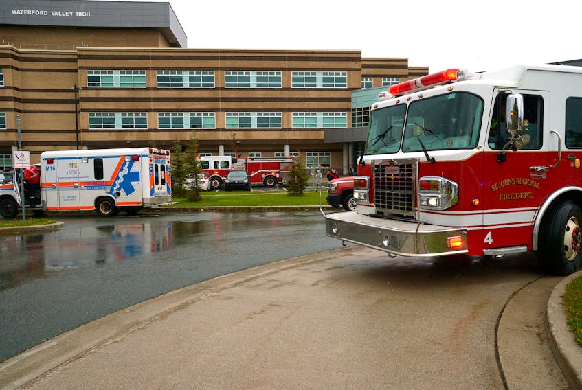 Two students were treated for minor smoke inhalation following a fire at Waterford Valley High School Wednesday afternoon.