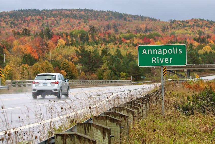 A motorist prepares to drive over the Annapolis River on Highway 101 near Bridgetown on Oct. 17.
