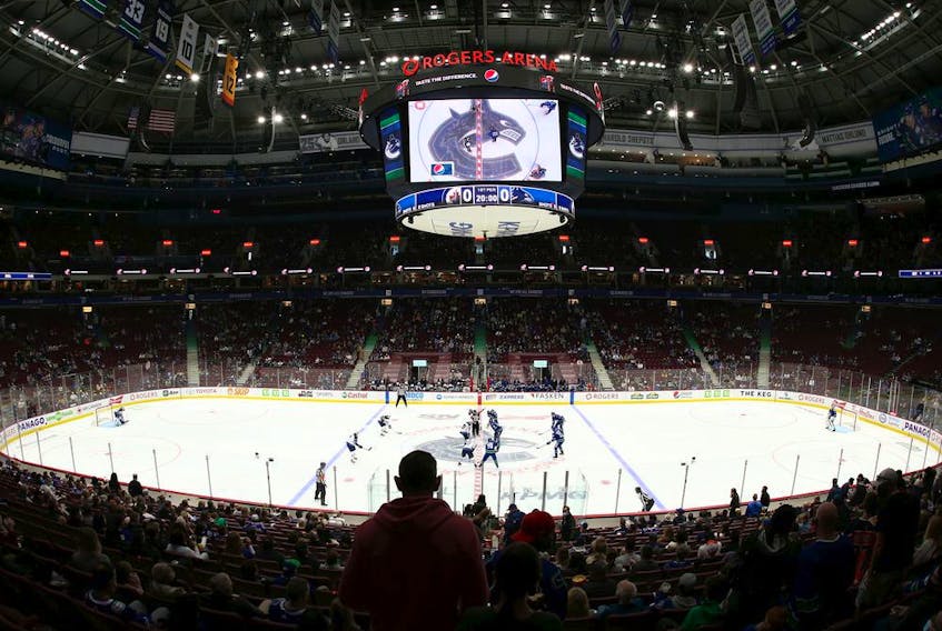 Fans return to Rogers Arena for the first time since March 2020 as the Vancouver Canucks and Winnipeg Jets face off during their preseason NHL game at Rogers Arena on October 3, 2021 in Vancouver, British Columbia, Canada.