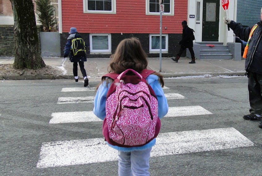 A photo of a girl crossing the street was taken by one of the newcomer families participating in a research project led by Dr. Jessie-Lee McIsaac, assistant professor and director of the Early Childhood Collaborative Research Centre at Mount Saint Vincent University. A photo exhibit will be held Saturday at the Emera Oval to share the experiences of nine families accessing child and youth programming in Halifax. - Contributed by the Early Childhood Collaborative Research Centre.