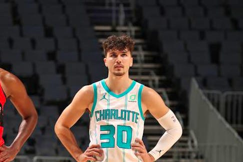 Bedford's Nate Darling during a game for the NBA's Charlotte Hornets last season.