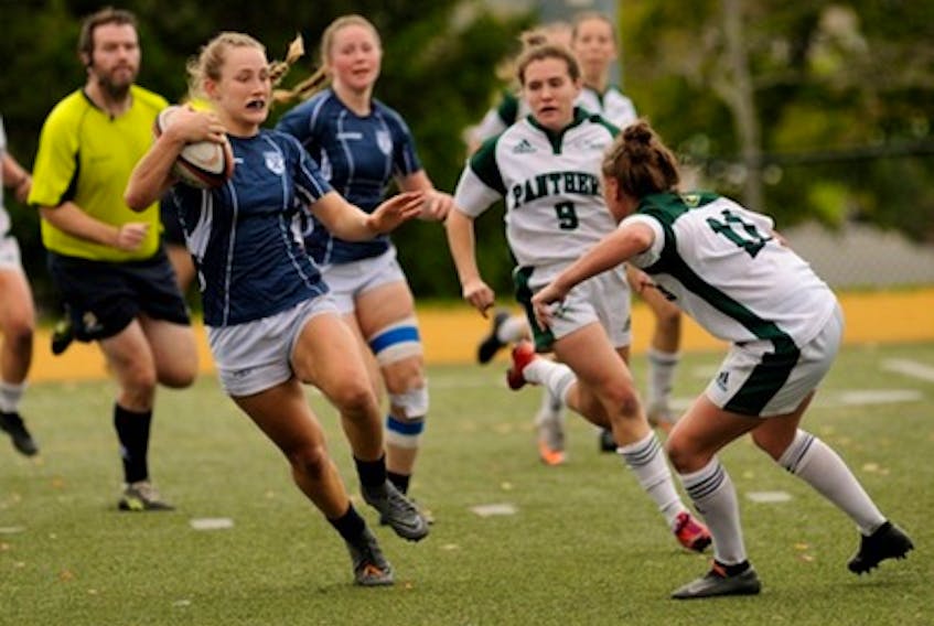 The St. Francis Xavier X-Women defeated the UPEI Panthers 35-15 in the AUS rugby semifinal Saturday in Antigonish. - BRYAN KENNEDY