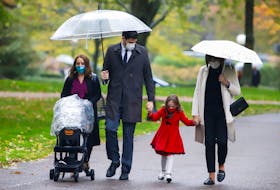 MP Sean Fraser arrives with his family to attend the swearing-in ceremony of Justin Trudeau new cabinet at Rideau Hall in Ottawa on Tuesday, Oct. 26, 2021.