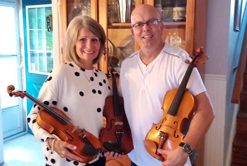 Sherry Bagnell donated three of her late father's fiddles to Emily Tuck's former fiddle teacher, Shawn Macdonald, in Sydney. The fiddles are going to promising students.