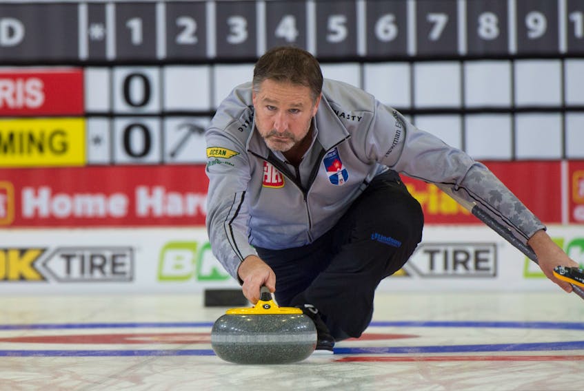 Paul Flemming throws a stone in his game against Pat Ferris at the Home Hardware Canadian Curling Pre-trials in Liverpool on Tuesday morning. Flemming wion the game 11-6. - Michael Burns/Canadian Curling