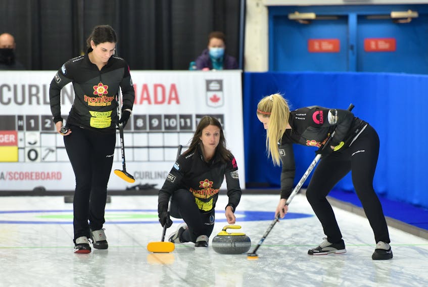 Skip Suzanne Birt releases a shot during the Canadian Curling Trials Direct Entry event in Ottawa in September. Lead Michelle McQuaid, left, and second stone Meagan Hughes sweep. The Birt rink, which curls out of the Cornwall and Montague clubs, is 2-1 after two days of play at the 2021 Home Hardware Curling Pre-Trials event in Liverpool, N.S. Curling Canada/Claudette Bockstael