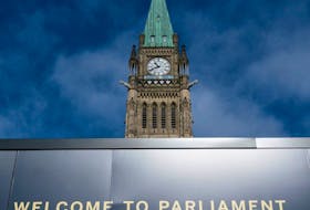  The Peace tower is seen above a welcome sign as politicians began returning to work earlier this month in Ottawa. THE CANADIAN PRESS/Adrian Wyld